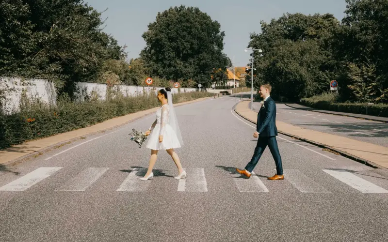 Couple crossing a zebra crossing in Gråsten