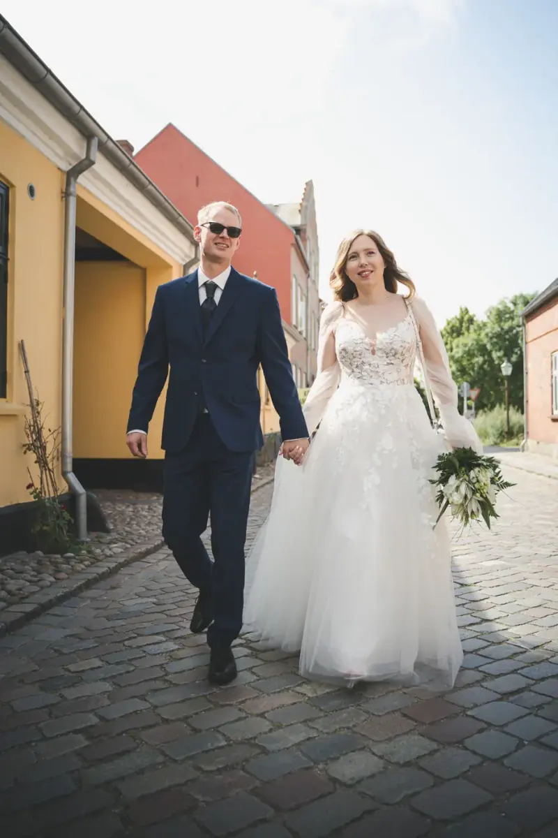 Couple strolling through Ribe old town
